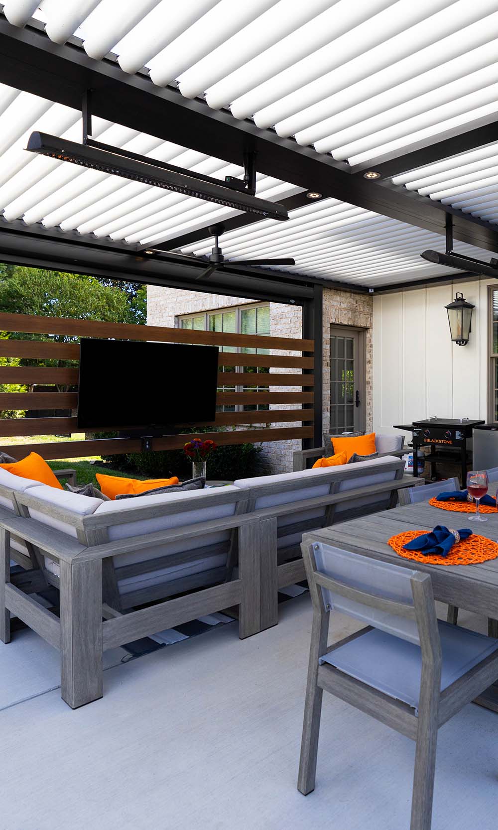 Sonance Speaker outside in front of vining jasmine